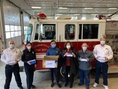 Pandemic Responders donates 700 surgical masks to Stewartville Fire Department